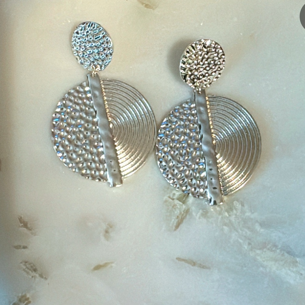 Silver every day earring.